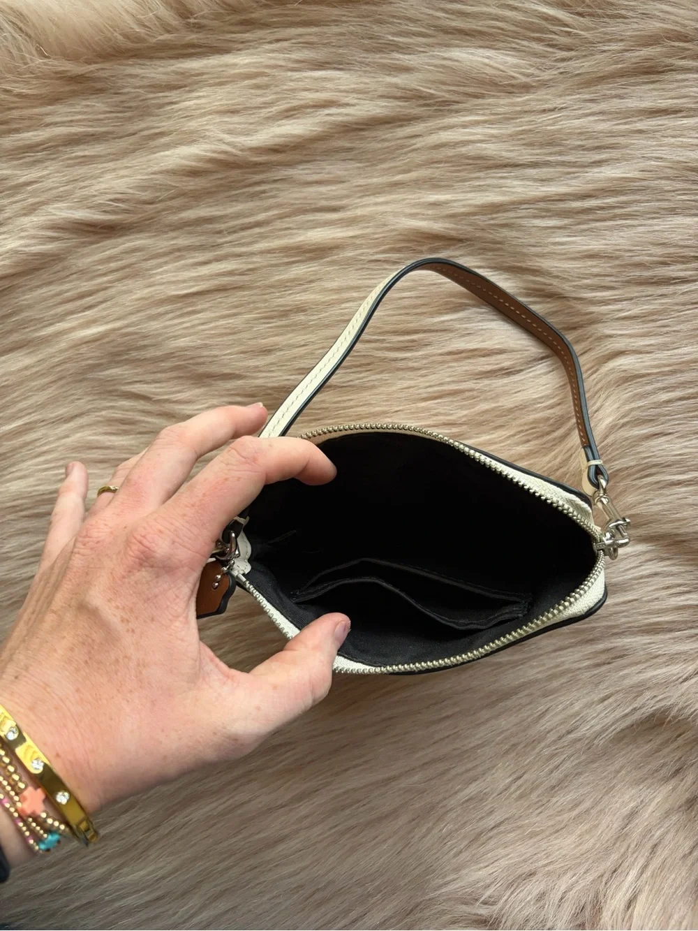 Coach Cream Leather Wristlet with Brown Trim and Silver Hardware